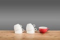 Different coffee cups on the wooden table