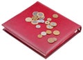 Different coins on red numismatics album