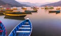 Different color Boats in Phewa Lake with Sunset