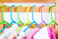 Different color clothes t-shirts on the rack Royalty Free Stock Photo