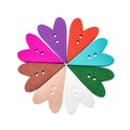 Different color heart shaped sewing buttons in a flower shape. Royalty Free Stock Photo