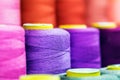 Different color spools of thread for the textile industry Royalty Free Stock Photo