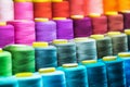 Different color spools of thread for the textile industry Royalty Free Stock Photo