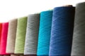 Different color spools of thread for the textile industry Royalty Free Stock Photo
