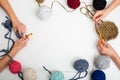 Children hands are crocheted and thread on white table Royalty Free Stock Photo