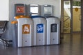 Different Colored Bins For Collection Of Recycle Materials in airport. Royalty Free Stock Photo