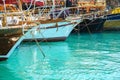 Different colored boats yachts moored in a harbor Royalty Free Stock Photo