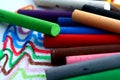 Different Colored Pastels or coloring materials Royalty Free Stock Photo