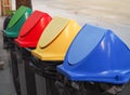 Different colored recycle garbage trash Bins in the park. Royalty Free Stock Photo