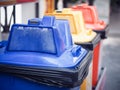 Different colored recycle garbage trash Bins in the park. Royalty Free Stock Photo