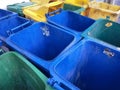 Different colored recycle garbage trash Bins at Sidewalk Royalty Free Stock Photo