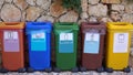 Different Colored Recycle Waste Bins for plastic, metal, paper, glass, organic Royalty Free Stock Photo