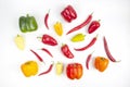 Different colored sweet and bitter peppers on a white background. vitamin food Royalty Free Stock Photo