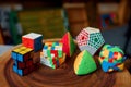 Different colorful puzzle cubes with unusual shape