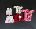 different colors knitted doll clothes, adorable collection of knitted doll clothes