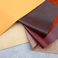 Natural leather textures samples on gray stone background Royalty Free Stock Photo