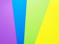 Different colors paper abstract background template. Pink, blue, green and yellow cardboard paper sheets Royalty Free Stock Photo