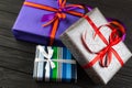 Different colors and sizes gift box on wooden table Royalty Free Stock Photo