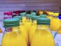 Different colour Juice in plastic bottles in a series for healthy lifestyle Royalty Free Stock Photo