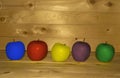Different Colours of apple on wooden backgraund Royalty Free Stock Photo