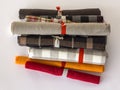 Different colours rolls of linen cloth Royalty Free Stock Photo