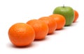 Different concepts with mandarins and apple Royalty Free Stock Photo