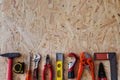 Different construction tools with Hand tools for home renovation on wooden board maintenance and reparing concept Royalty Free Stock Photo