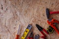 Different construction tools with Hand tools for home renovation on wooden board maintenance and reparing concept Royalty Free Stock Photo