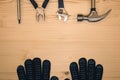 Different construction tools instruments on wooden background.