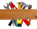 Different construction tools and wooden plank