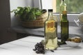 Different cooking oils and ingredients on white wooden table indoors Royalty Free Stock Photo