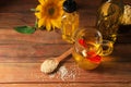 Different cooking oils and ingredients on wooden table, above view Royalty Free Stock Photo
