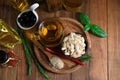 Different cooking oils and ingredients on wooden table, flat lay Royalty Free Stock Photo