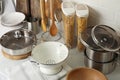 Different cooking utensils and raw pasta on countertop in kitchen, above view Royalty Free Stock Photo