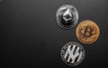 different cryptocurrencies coins bitcoin, litecoin and ethereum isolated on black background