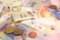Different currency note and coins from different countries background Royalty Free Stock Photo