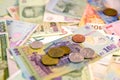 Different currency note and coins from different countries background Royalty Free Stock Photo