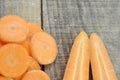 Different cut carrots on wooden Royalty Free Stock Photo