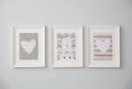 Different cute pictures on wall. Baby room interior Royalty Free Stock Photo