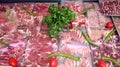 Different Cuts of Fresh Raw Red Meat in a Supermarket Royalty Free Stock Photo