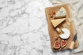 Different delicious cheeses served on marble table, top view. Space for Royalty Free Stock Photo