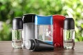 Different deodorants on wooden table Royalty Free Stock Photo