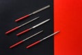 Different diamond file set on black red background with place for text