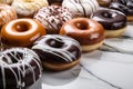 Different donuts with chocolate glazing