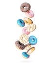 Different donuts are falling down on a white background Royalty Free Stock Photo