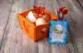 Different Easter eggs table decoration with postcard Royalty Free Stock Photo
