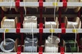 Different electric white cables. Wire wound into skeins and rings. Electric wires cable products samples in store