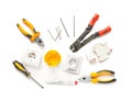 Different electrician\'s tools and supplies on white background Royalty Free Stock Photo