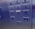 Different elevators buttons in modern metal lift