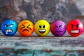 Different emotions. A colorful collection of cartoon faces with a variety of expressions, including anger, sadness, and happiness Royalty Free Stock Photo